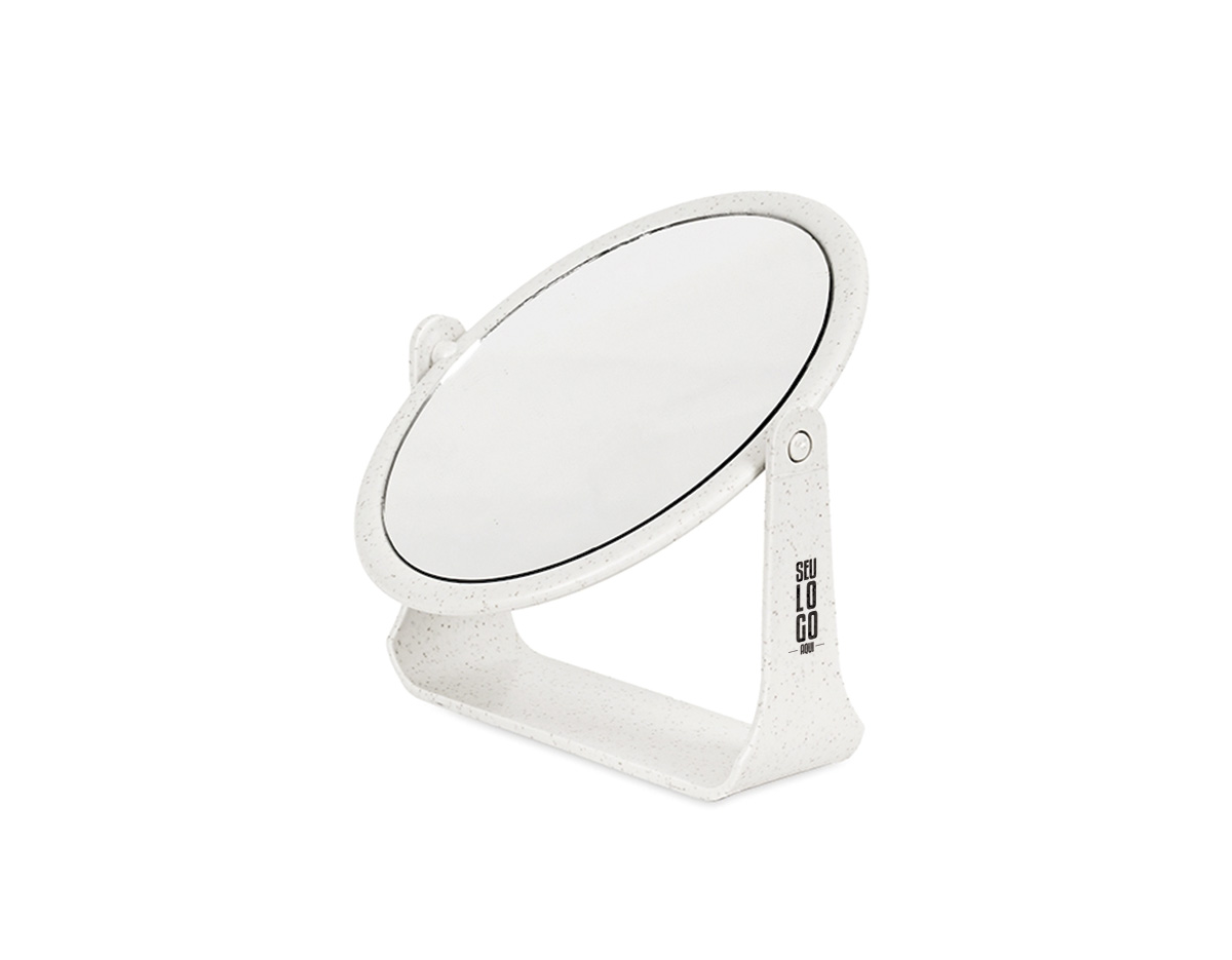 Espelho de mesa oval dupla face, sem aumento, ideal para uso diário em ambientes residenciais ou corporativos. Possui moldura e base confeccionadas em plástico polipropileno (PP), material leve e resistente, que garante estabilidade e durabilidade ao produto. Prático e funcional, é perfeito para apoiar sobre mesas, penteadeiras ou bancadas, sendo também uma ótima opção de brinde útil e elegante para ações promocionais.
