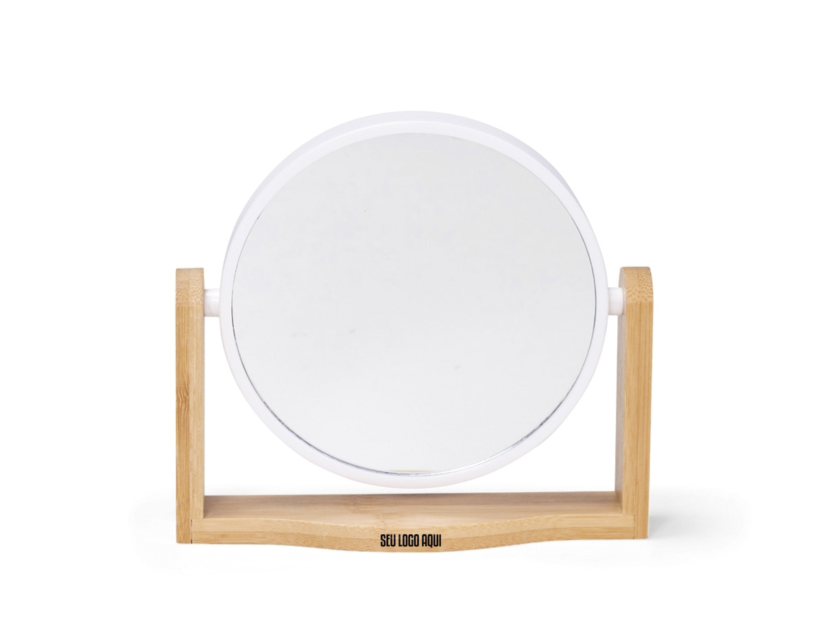 Espelho giratório com base em bambu e moldura em plástico, unindo design moderno e praticidade. A base em bambu confere um toque natural e elegante, enquanto o sistema giratório facilita o uso no dia a dia. Uma opção funcional e sofisticada, ideal para brindes corporativos que valorizam utilidade e estilo.