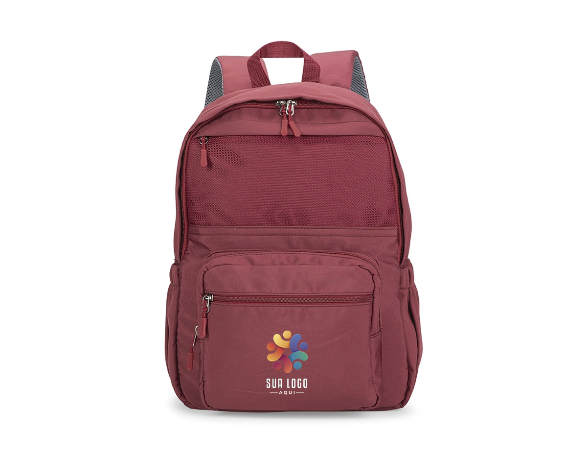 Mochila em Oxford impermeável com fechamento em zíper e capacidade máxima de até 23 litros. Apresenta divisória interna para notebooks de até 15,6 polegadas. Conta ainda com três bolsos frontais em tamanhos diferentes, incluindo bolso superior em tela de malha para itens úmidos, além de dois bolsos laterais com elástico, alça de mão em nylon e duas alças de ombro com revestimento em espuma respirável.