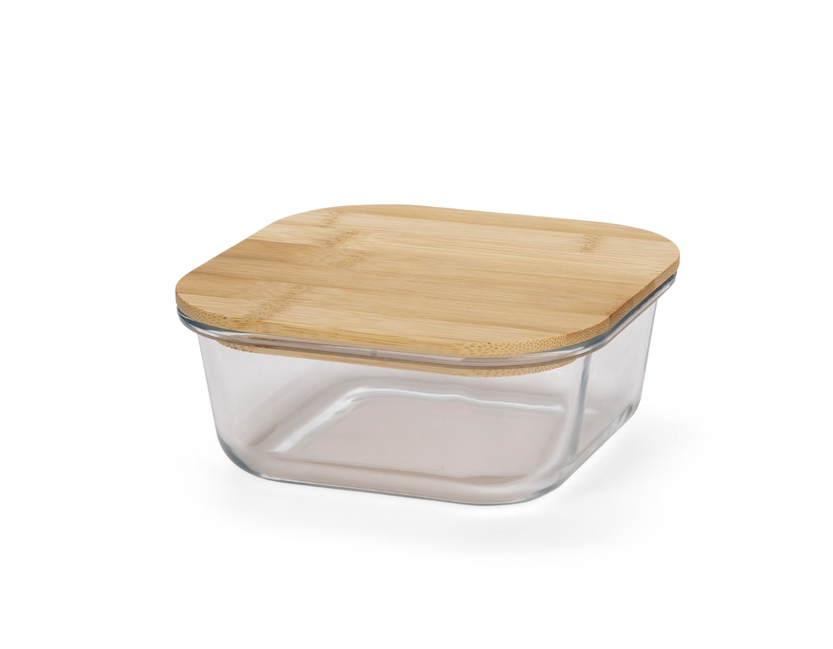 Marmita em vidro borossilicato com capacidade para até 650ml. Possui tampa hermética em bambu. Retire a tampa da marmita antes de levá-la ao micro-ondas. Marmita versátil para freezer e micro-ondas.