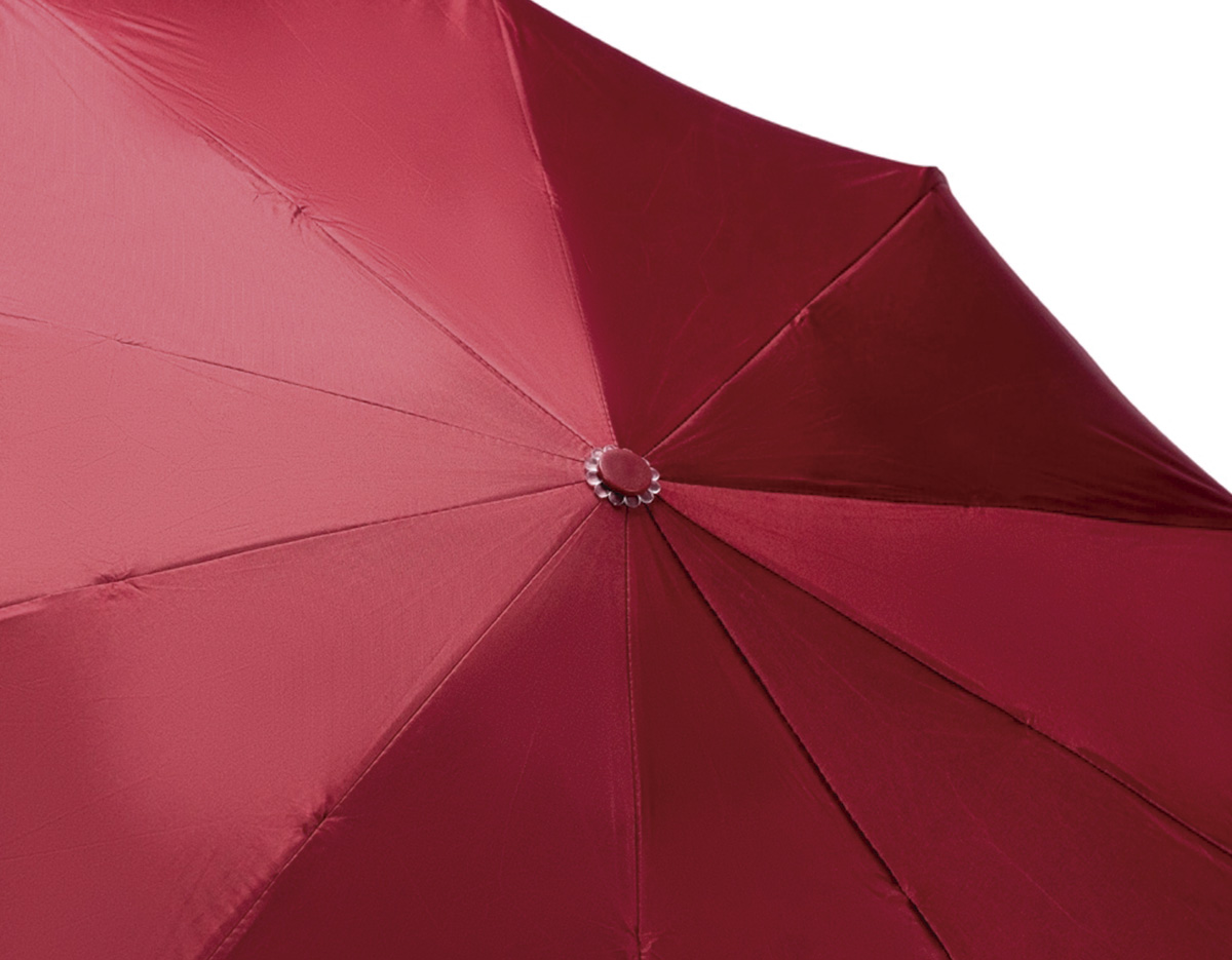 Guarda-chuva confeccionado em poliéster de impacto impermeável com abertura automática por botão em plástico que, ao ser acionado uma segunda vez, ativa a retração dos gomos, facilitando o fechamento. Possui estrutura com haste em ferro, pegador ergonômico em formato de mosquetão feito em polipropileno (PP), 10 varetas em fibra de vidro e ferro com molas amortecedoras, além de faixa para fechamento em velcro. Acompanha capa protetora.