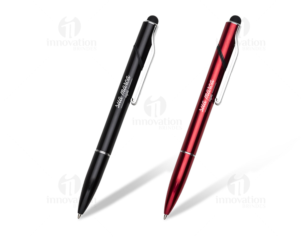 Caneta semimetal base para celular e com ponteira touch. Corpo colorido com detalhes prata, parte superior aonde fica o clip plástico é giratória