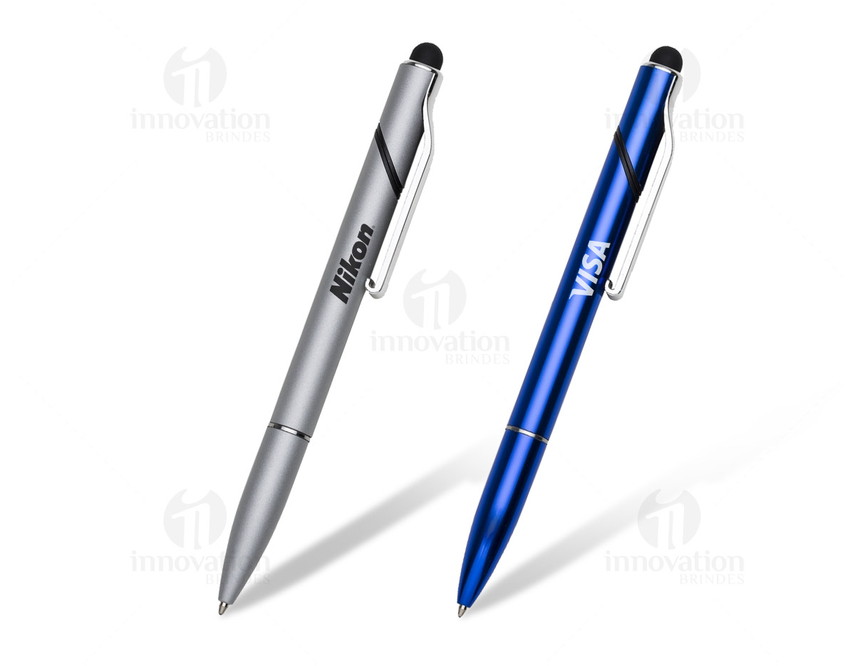 Caneta semimetal base para celular e com ponteira touch. Corpo colorido com detalhes prata, parte superior aonde fica o clip plástico é giratória