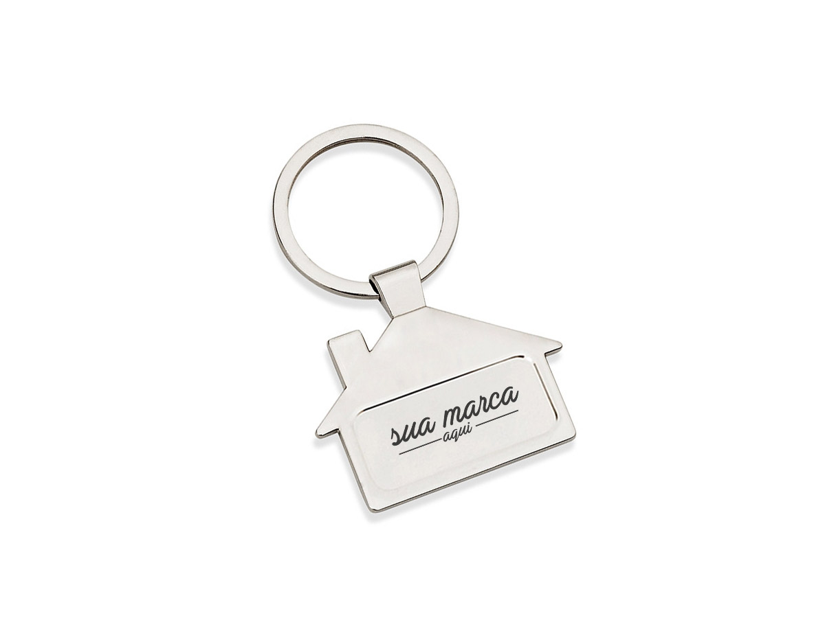 Chaveiro metal brilhante formato casa. Parte frontal com desenho em relevo das janelas e portas, verso com um retângulo no centro, ideal para personalização.