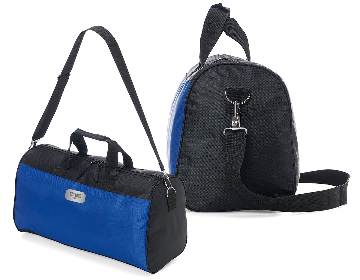 Bolsa de poliéster impermeável com capacidade de 26 litros. Possui compartimento principal com amplo espaço e um pequeno bolso interno para acessórios, além de um bolso lateral em tela. A bolsa contém alças de nylon para mãos com suporte de velcro para unificação das alças, alça transversal regulável, duas fivelas superiores para encaixe da alça transversal, zíperes com puxadores emborrachado e revestimento interno de poliéster.