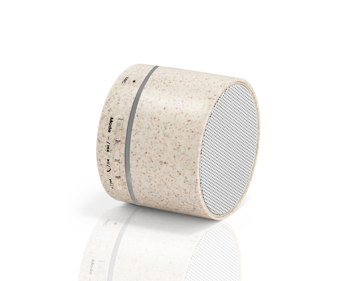 Caixa de som portátil em fibra de palha de trigo e ABS com microfone. Potência de 3W e transmissão por bluetooth 5.0. Com tempo de reprodução de 2 horas e uma bateria de 300 mAh