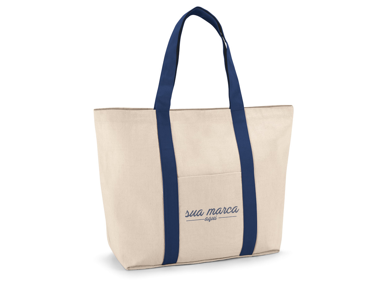 Sacola 100% algodão canvas (280 g/m²) com bolso frontal e bolso interior com zíper. A sacola contém fecho magnético e alças de 60 cm