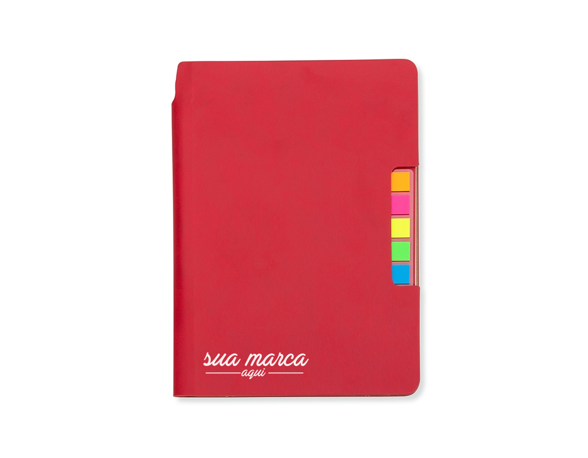 Caderno produzido em couro sintético com autoadesivos. Capa interna com cinco bloquinhos autoadesivos coloridos com aproximadamente 25 folhas cada e bloco com aproximadamente 80 folhas pardas pautadas.