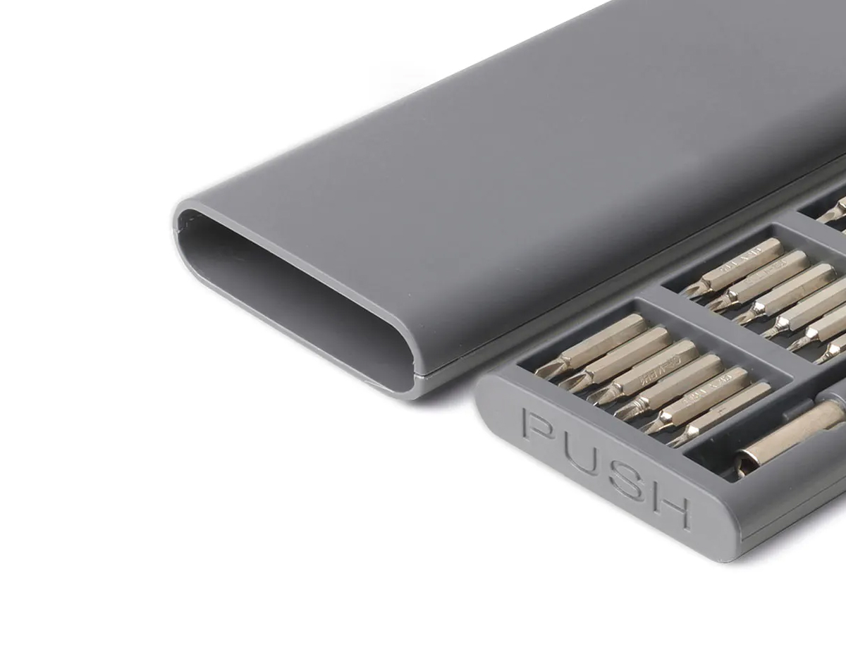 Kit ferramentas em plástico ABS com 24 pontas em aço inox, chave manual para encaixe e manuseio.