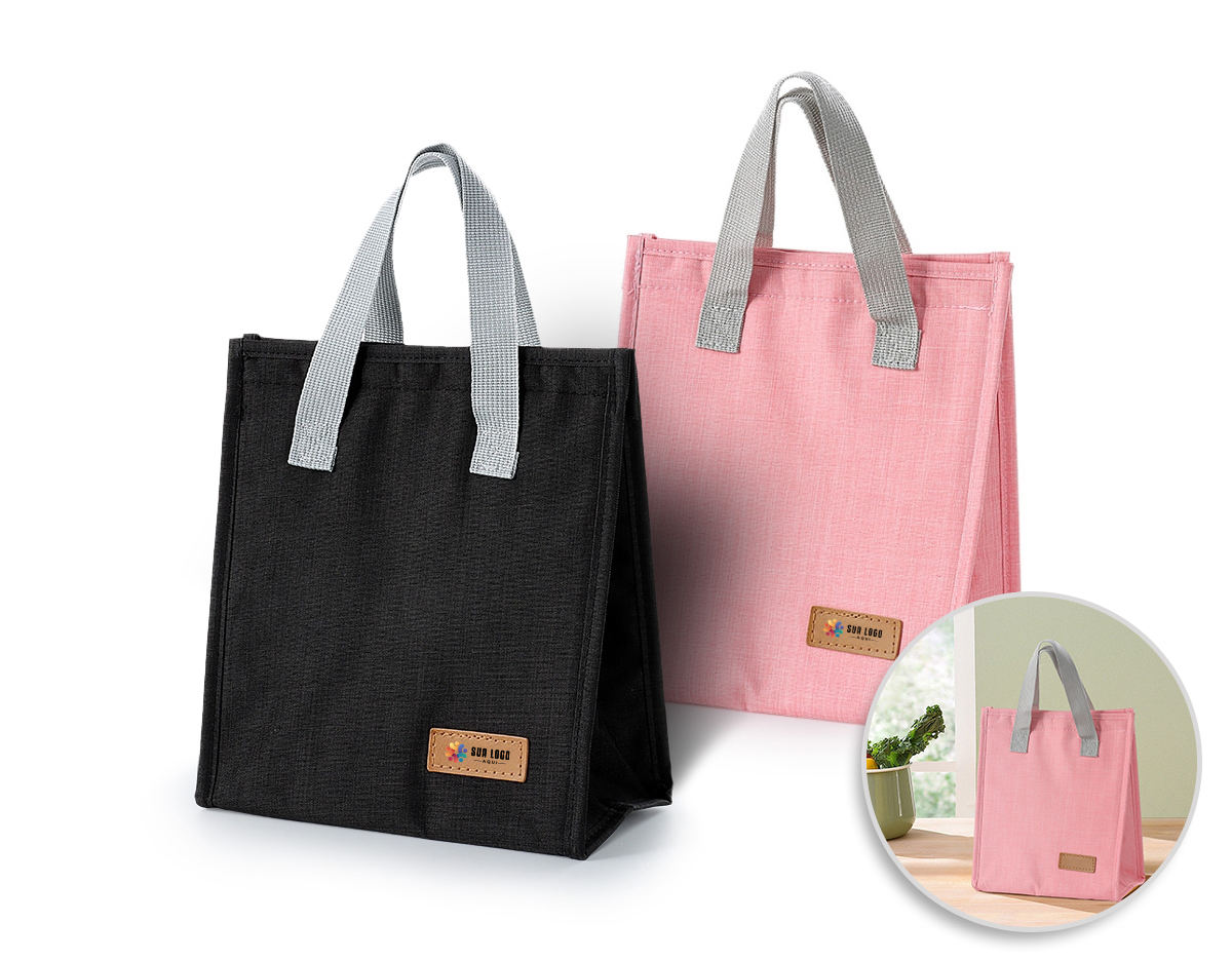 Bolsa térmica oxford com capacidade de 5 litros com fechamento em velcro. Contém alças de mãos 