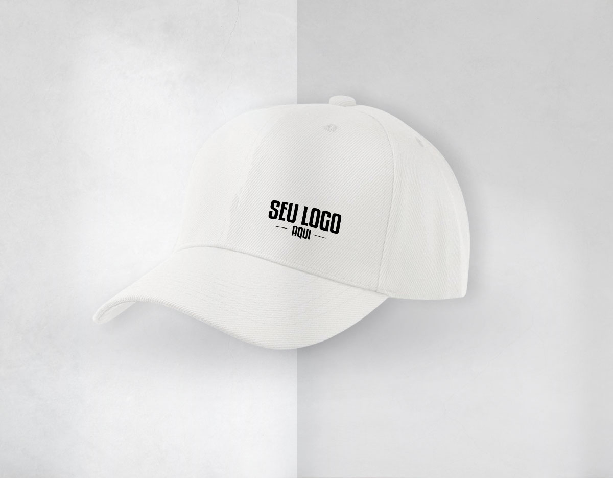 Boné modelo 6 gomos , confeccionado em tecido brim luxpremium pesado peletizado 100% algodão , com detalhes em ilhós , parte interna com entretela inteligente e acabamento com carneira em brim , 6 costuras na aba , botão encapado , fechamento com regulador em velcro.