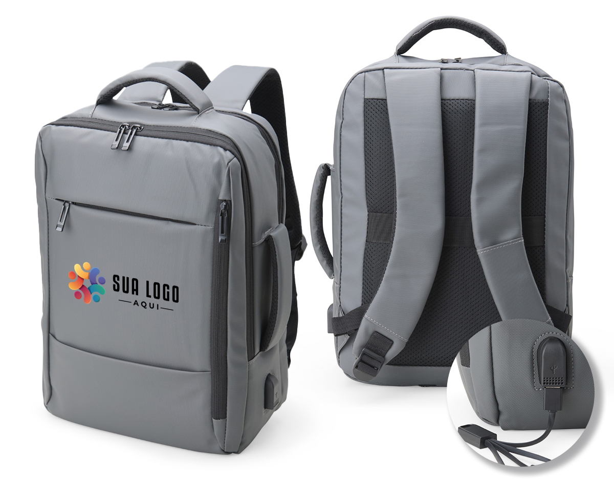 Mochila em couro sintético 23 litros resistente à água com quatro compartimentos, sendo o principal com bolso para notebook 15,6 e tablet 10. Com divisórias internas para acessórios, a mochila possui suporte externo usb, alça para encaixe em malas de viagem e duas alças de mãos, sendo uma delas lateral para o transporte da mochila no modo pasta.