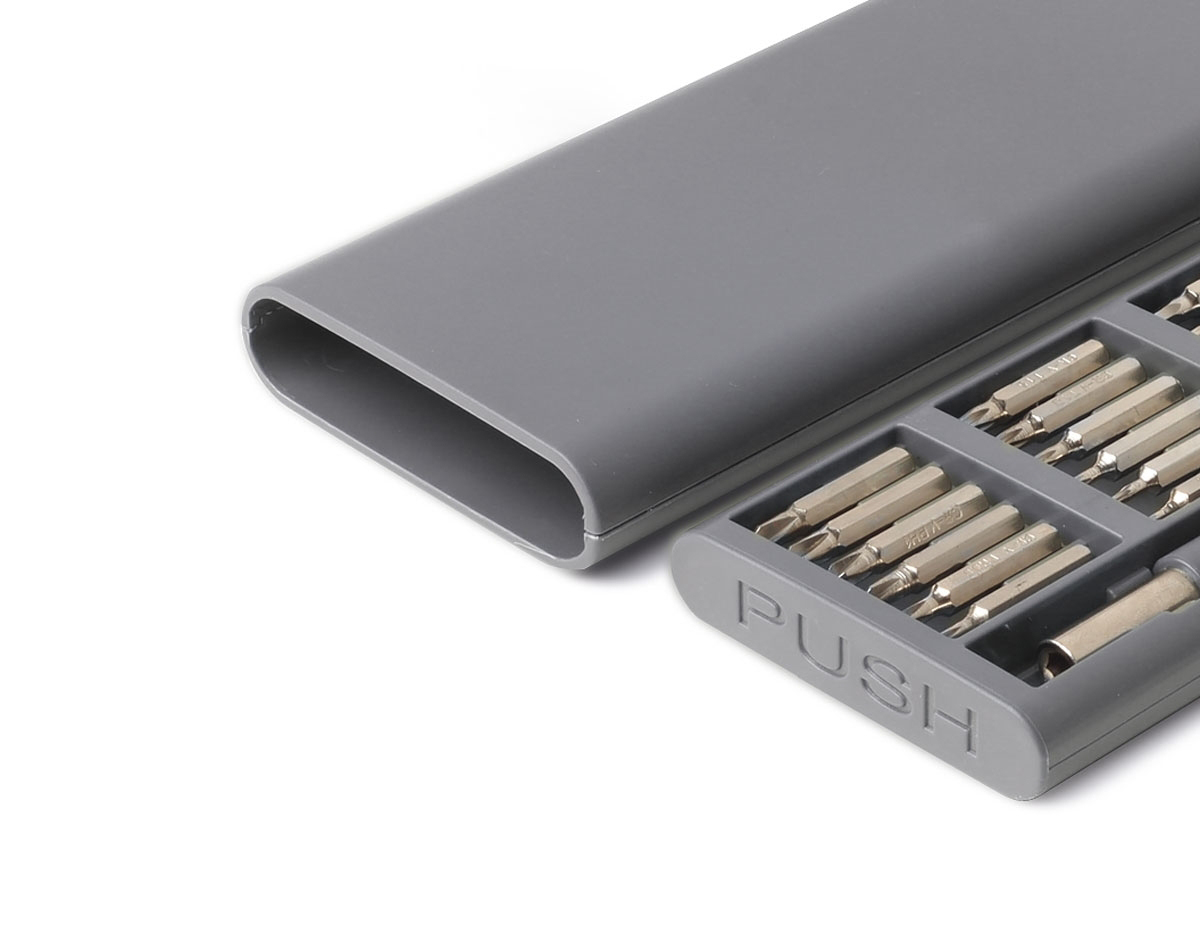 Kit ferramentas 25 peças em estojo de plástico ABS com abertura em clique. Acompanha: 5 ponteiras Philips, 1 ponteira Y, 6 ponteira Torx, 6 ponteira Allen, 5 ponteiras Fenda e 1 Fenda U em aço inox e chave para manuseio com encaixe imantado.