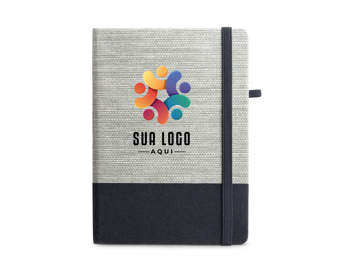 Caderno A5 de capa dura em palha e algodão canvas. Contém 96 folhas pautadas, fita separadora, elástico e suporte para esferográfica (não inclusa). 150 x 210 mm