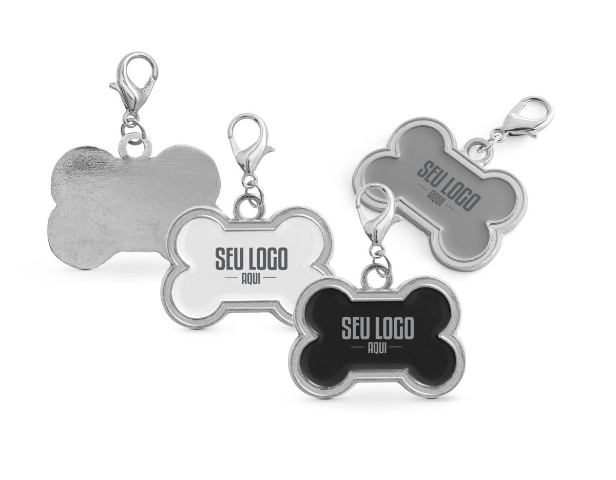 Chaveiro em formato de osso, com medidas de 32 x 22 x 2 mm. É ideal para identificar animais de estimação, oferecendo um acessório prático e funcional para personalização e fácil reconhecimento.