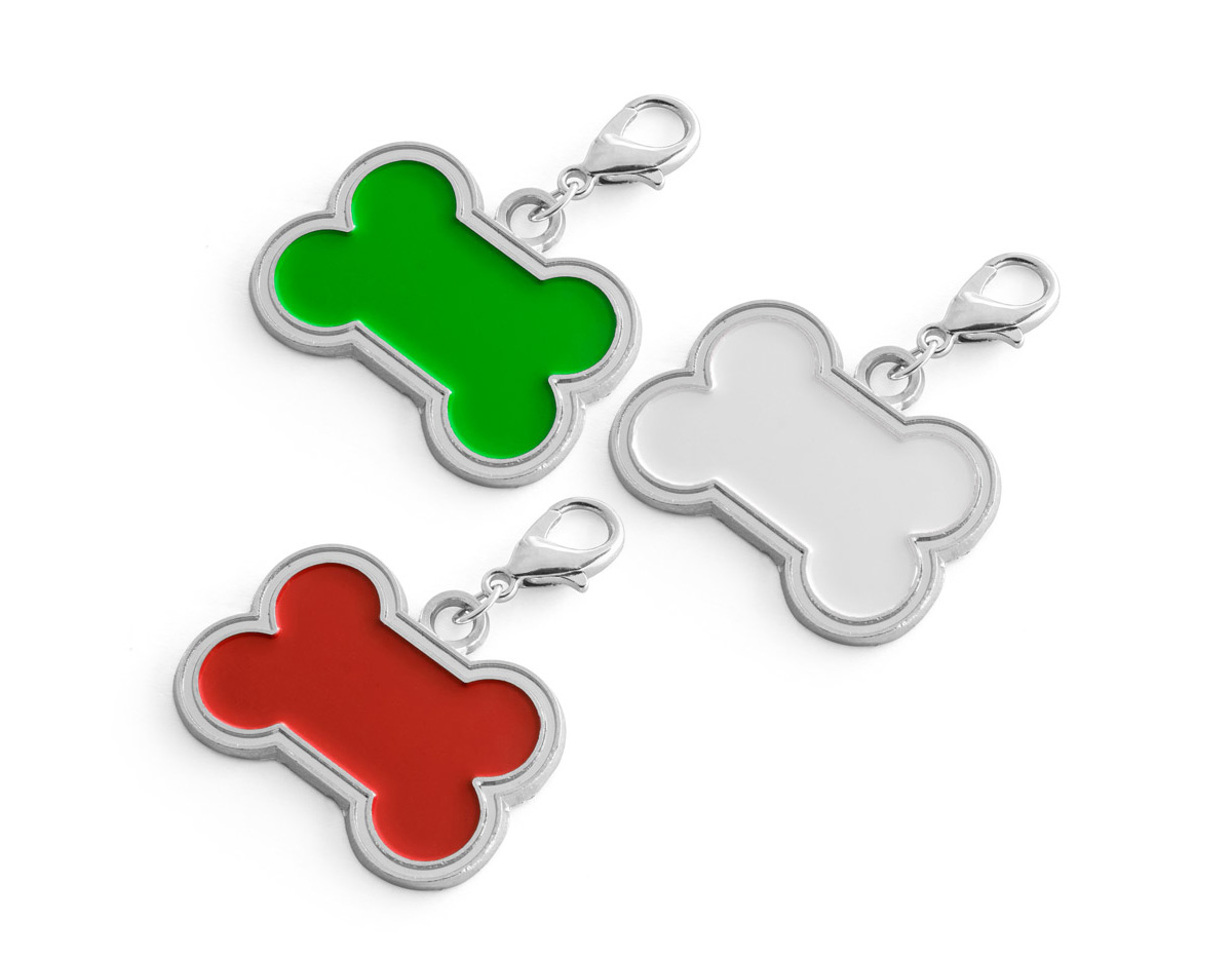 Chaveiro em formato de osso, com medidas de 32 x 22 x 2 mm. É ideal para identificar animais de estimação, oferecendo um acessório prático e funcional para personalização e fácil reconhecimento.