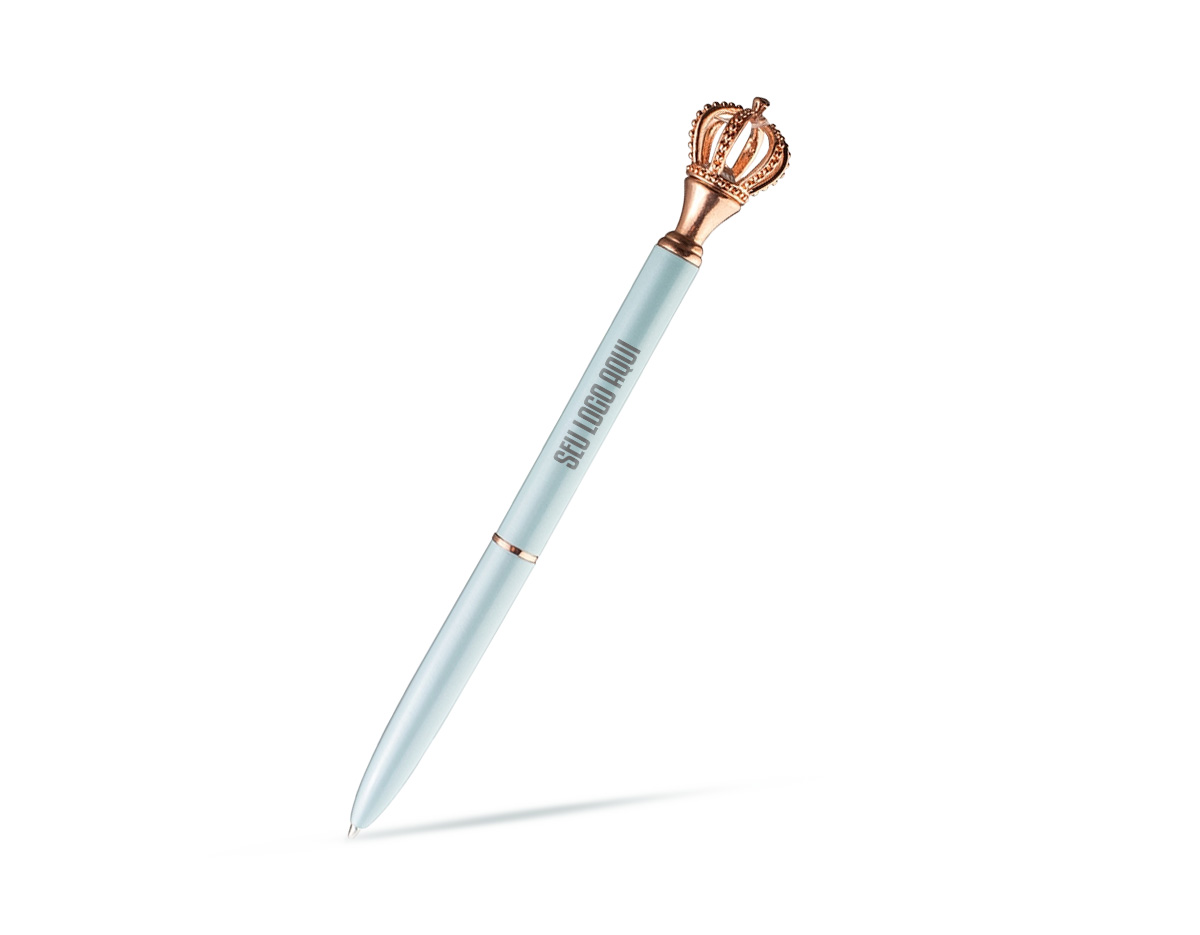 Rei ou Rainha da escrita? A nossa caneta metálica com acionamento por rotação, conta com uma coroa como detalhe decorativo no topo, agregando sofisticação e nobreza ao seu design. Possui ponta de 1.0 mm e carga esferográfica azul.