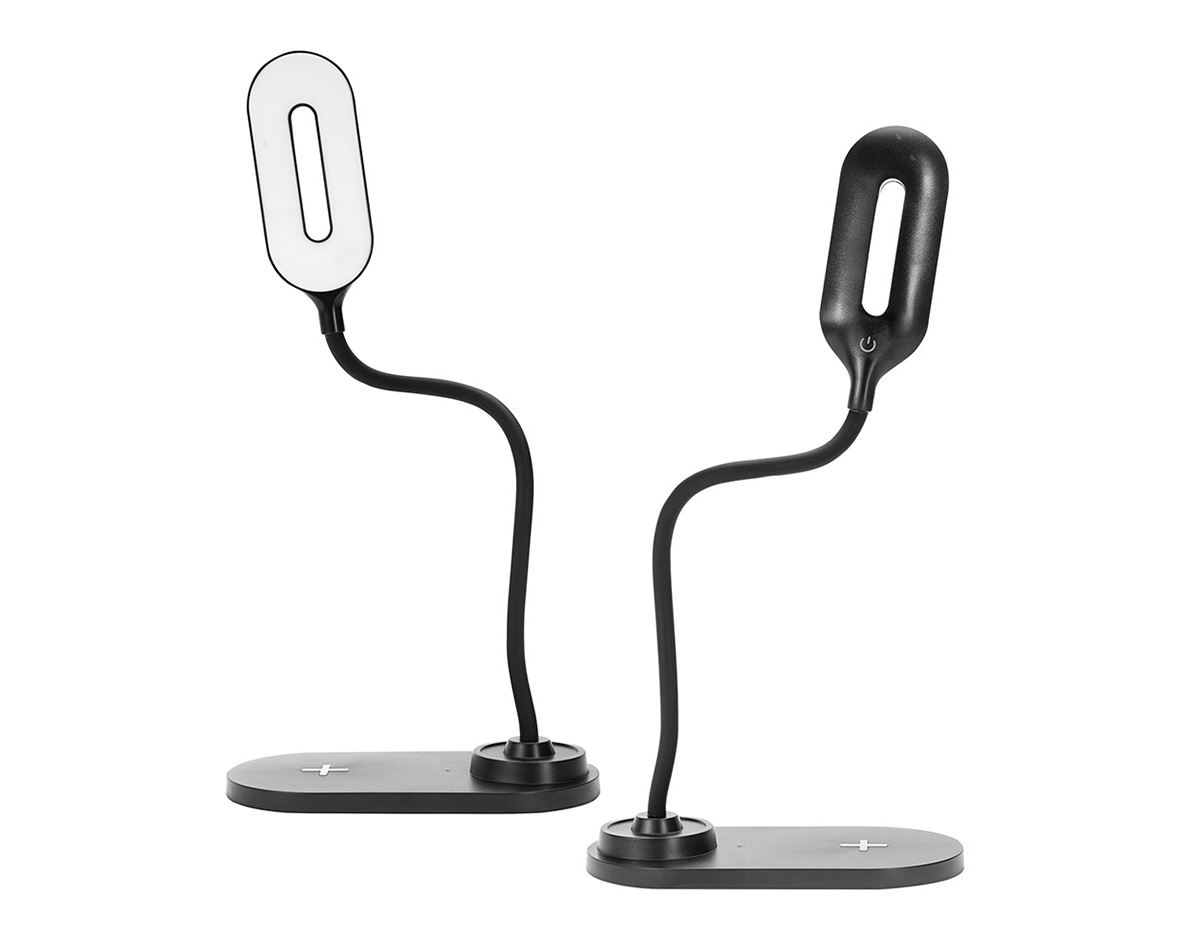 Luminária LED com 3 níveis de iluminação: luz quente (10 LEDs), fria (10 LEDs) e mista (20 LEDs). Possui base antideslizante, haste articulável e estrutura em plástico. A base permite carregamento de celulares por indução, indicado por um sinal de "+". Funciona conectada à energia e acompanha cabo USB Tipo-C.