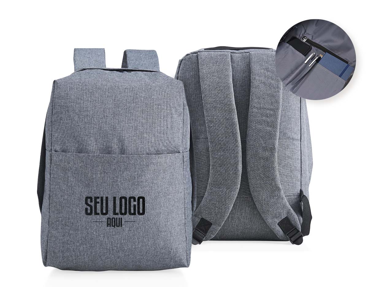 Mochila confeccionada em poliéster com compartimento para notebook até 15,6 polegadas. Contém uma divisória com bloqueador RFID e alça para encaixe em malas de viagem.
