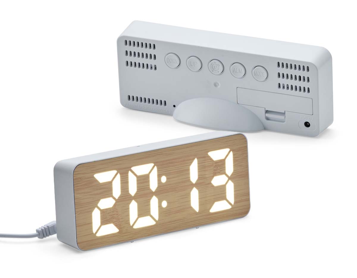 Relógio despertador feito em bambu e plástico, com painel LED que exibe hora, data e temperatura ambiente. Conta com alarme programável, com ajuste de frequência sonora e dias da semana. A luminosidade do display possui três níveis. Pode ser alimentado por 1 pilha AAA (não inclusa) ou via cabo USB 5V (incluso), unindo funcionalidade e design moderno.