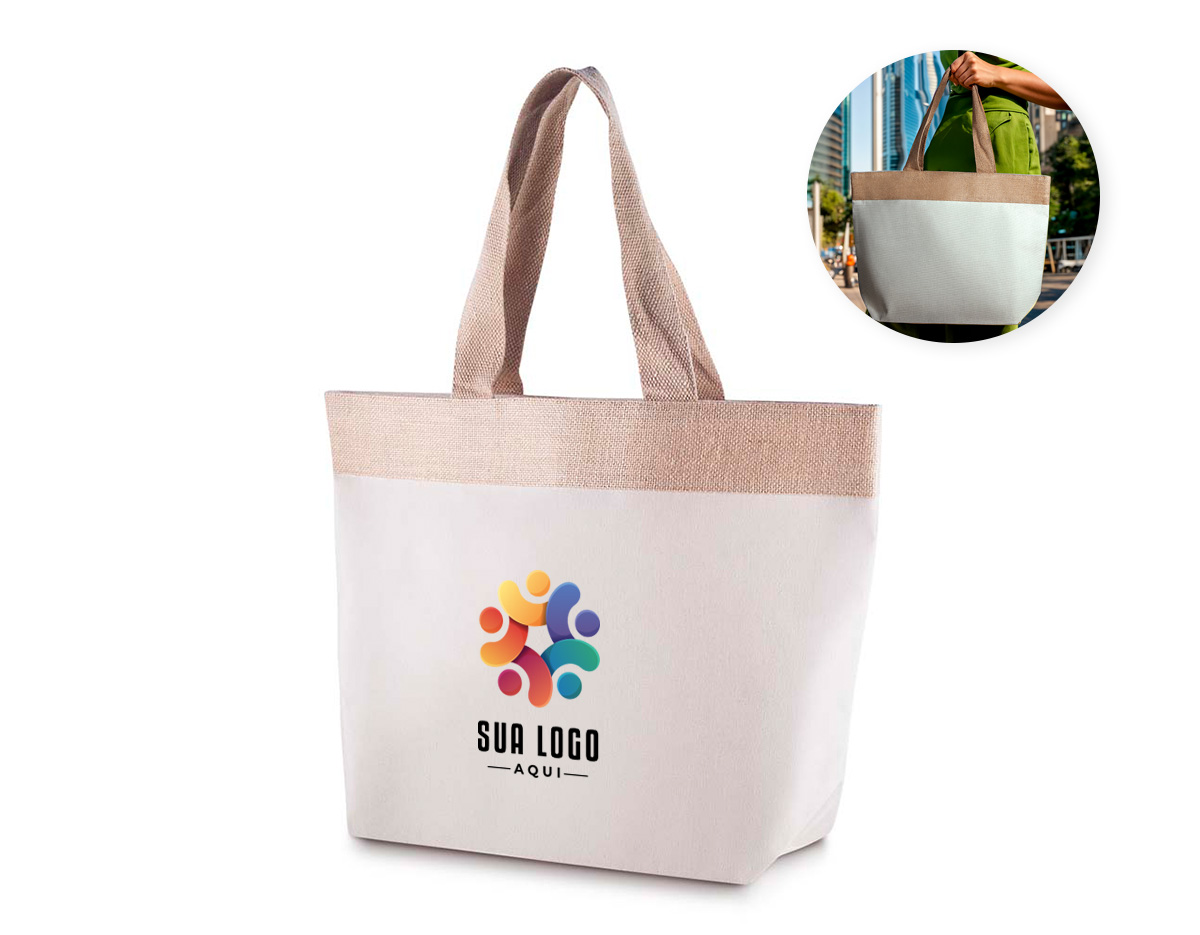 Sacola em algodão cru 220g/m² com detalhe em juta, oferecendo resistência e estilo natural. Conta com alça de 24 cm de altura, ideal para transporte com conforto. Perfeita para uso no dia a dia, eventos, feiras e ações promocionais, é uma opção sustentável e versátil, alinhando praticidade e responsabilidade ambiental.