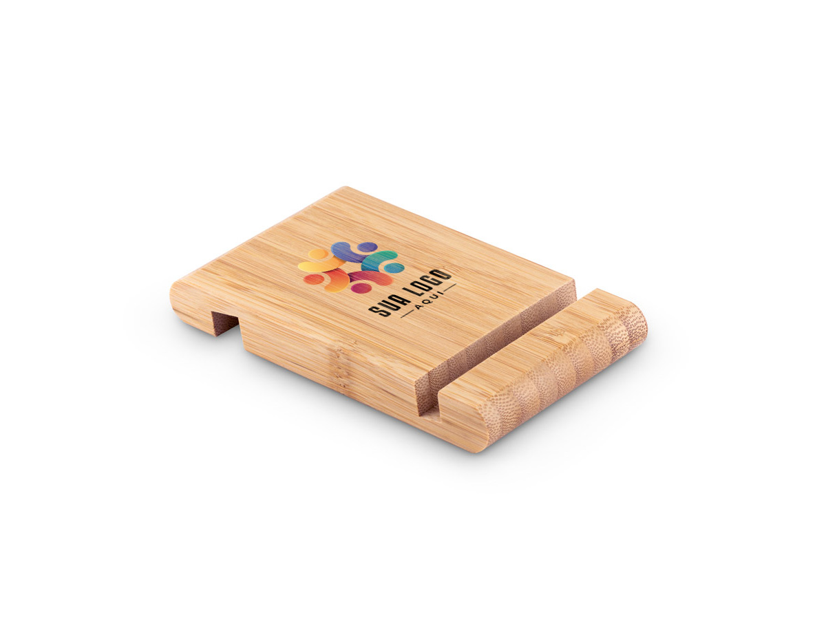 Suporte para celular em bambu com duas canaletas de tamanhos distintos, uma de cada lado, oferecendo diferentes ângulos de visualização. Design natural e funcional, perfeito como brinde corporativo sustentável para uso no escritório ou em home office.
